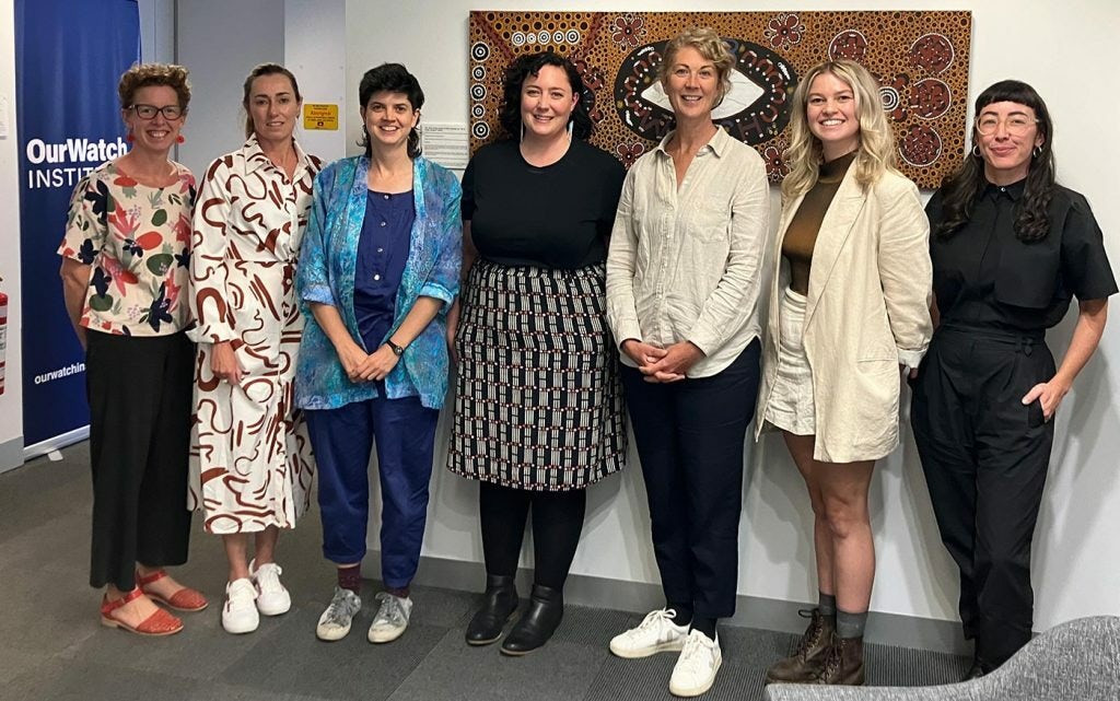 Photo of the Rainbow Health Australia and Our Watch LGBTIQA+ primary prevention project team From left to right: Ellen Poyner (Our Watch), Christine Gregory (Our Watch), Julia Earley (Rainbow Health Australia), Shaez Mortimer (Our Watch), Jami Jones (Rainbow Health Australia), Alexia Newsome (Our Watch), Belinda O’Connor (Rainbow Health Australia).