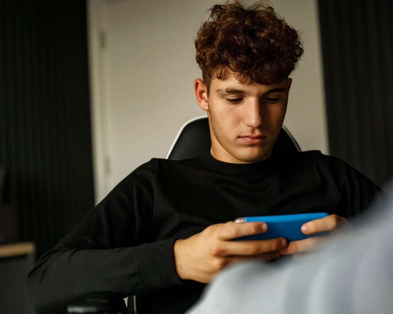 Young man using phone