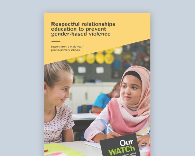 Cover of the publication showing two primary school-aged girls working together at a school desk. One is wearing a headscarf.